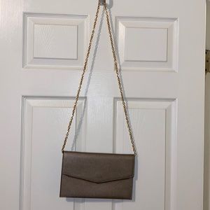 Madison West Gold purse